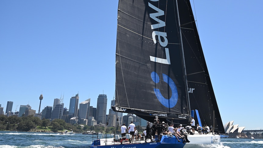 Supermaxi LawConnect sails down Sydney Harbour toward the finish line of the Big Boat Challenge.
