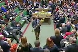Lloyd Russell-Moyle attempts to walk out of the House of Commons with the mace.