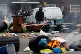 Rubbish fills a street in Hackney, east London, during rioting