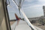 Jagged window glass on a Southwest Airlines flight, taken by a passenger and posted to Twitter.