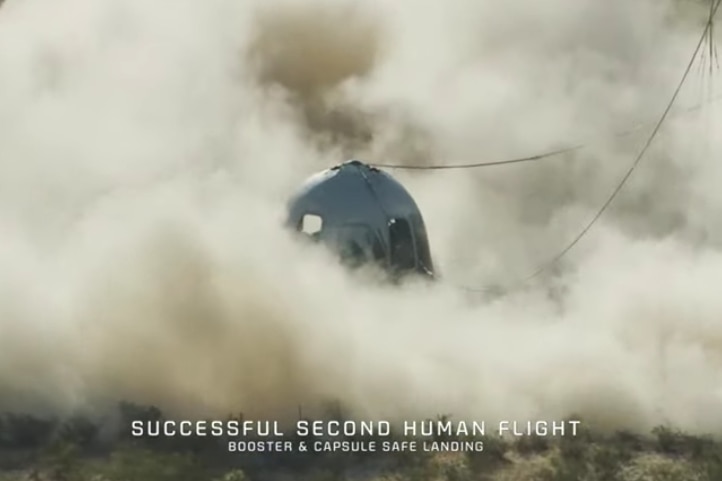 The capsule carrying four passengers landed safely with the help of parachutes, kicking up a cloud of dust.