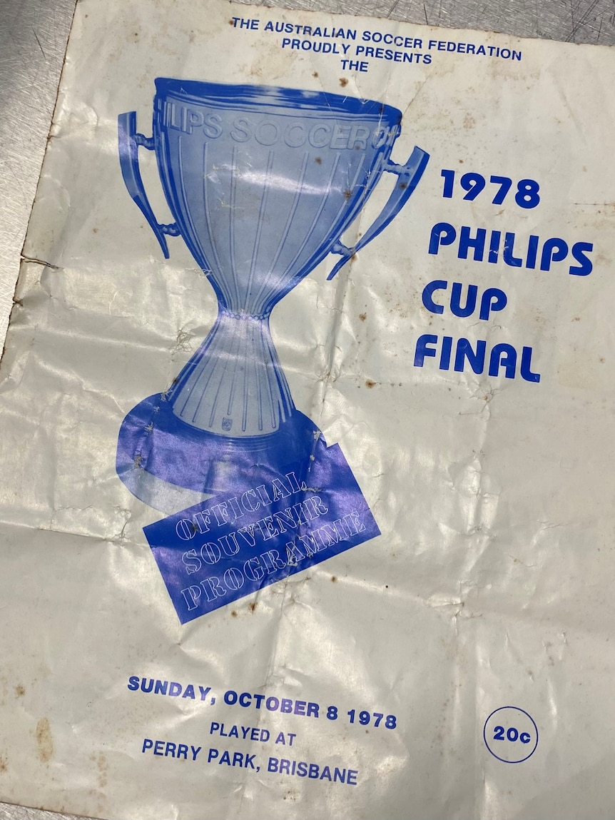 A programme printed in blue on white glossy paper with 1978 Philips Cup final and a picture of the cup on it