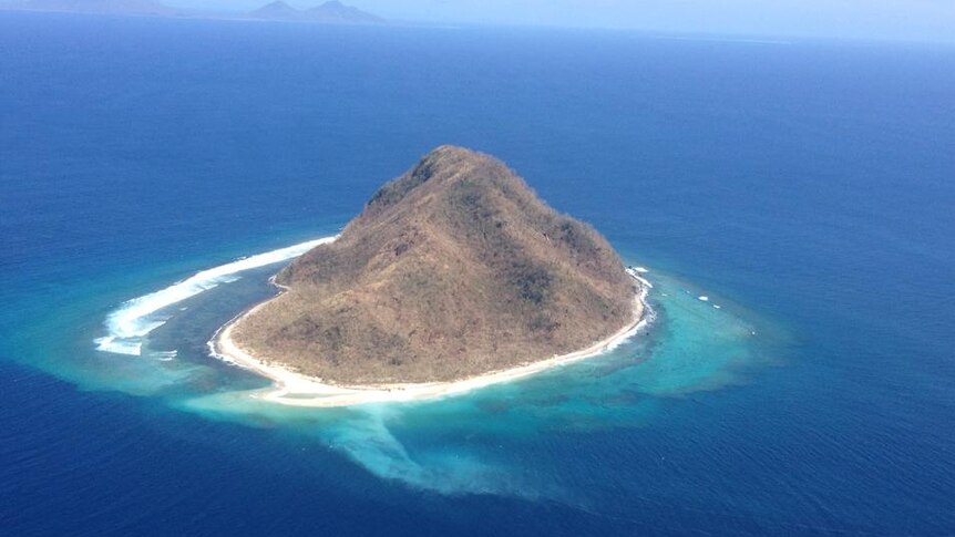 A small island off the coast of Epi island after Cyclone Pam After island off Epi