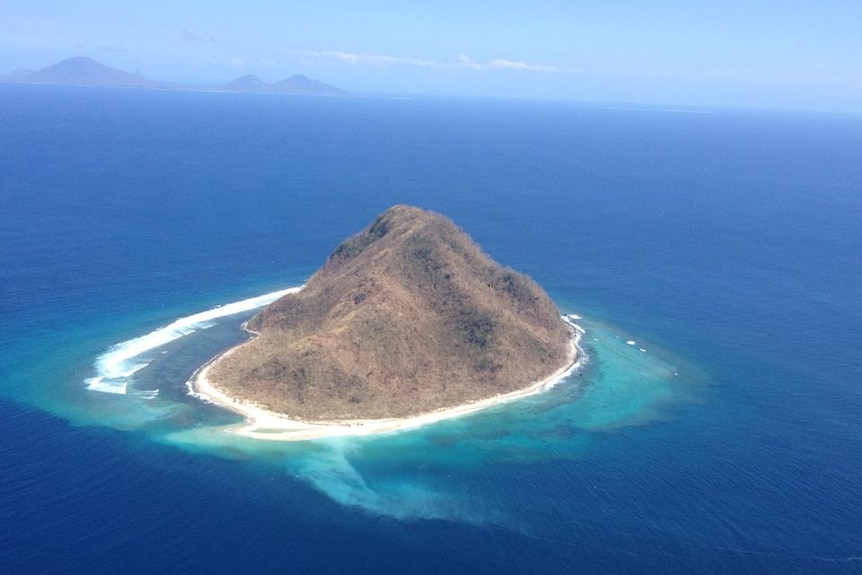 A small island off the coast of Epi island after Cyclone Pam After island off Epi