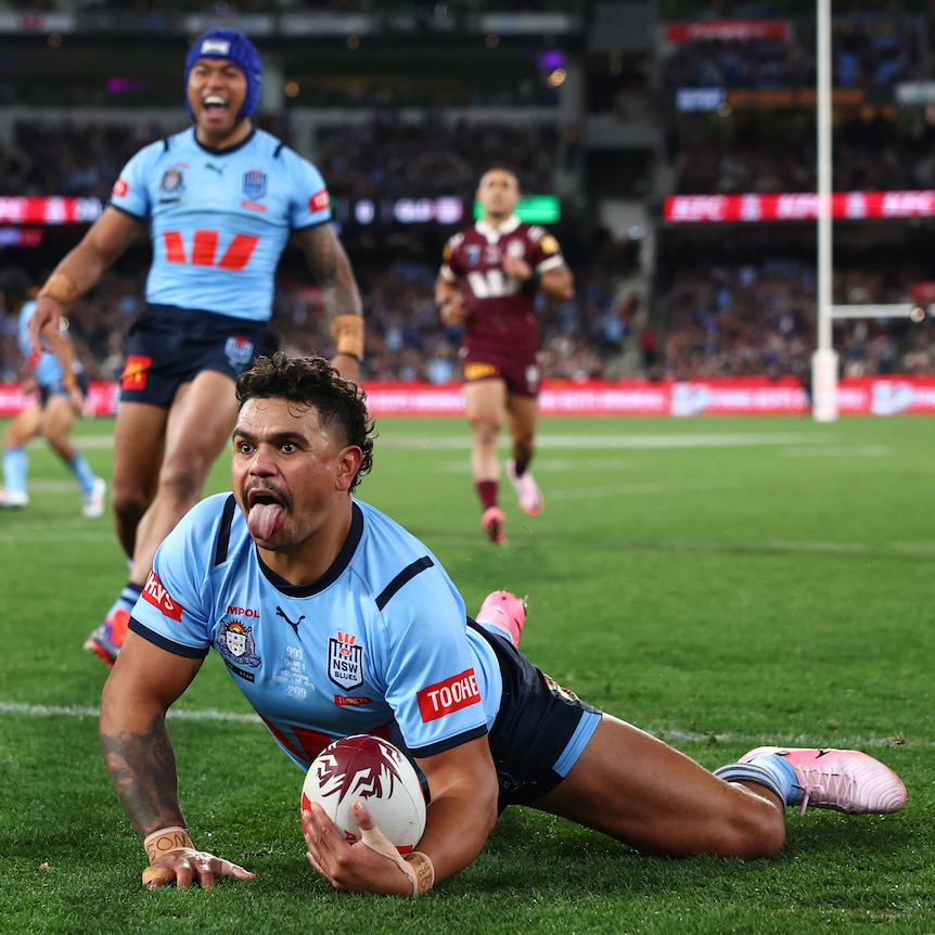 Latrell Mitchell scores a try for NSW in State of Origin II.