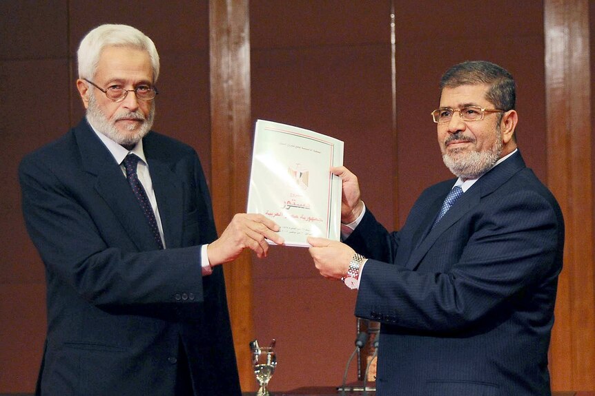 Hossam el-Gheriany and Mohamed Morsi
