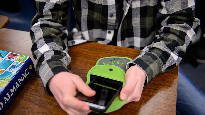 Students already benefiting from phone pouch trial at SA school, principal  says - ABC News