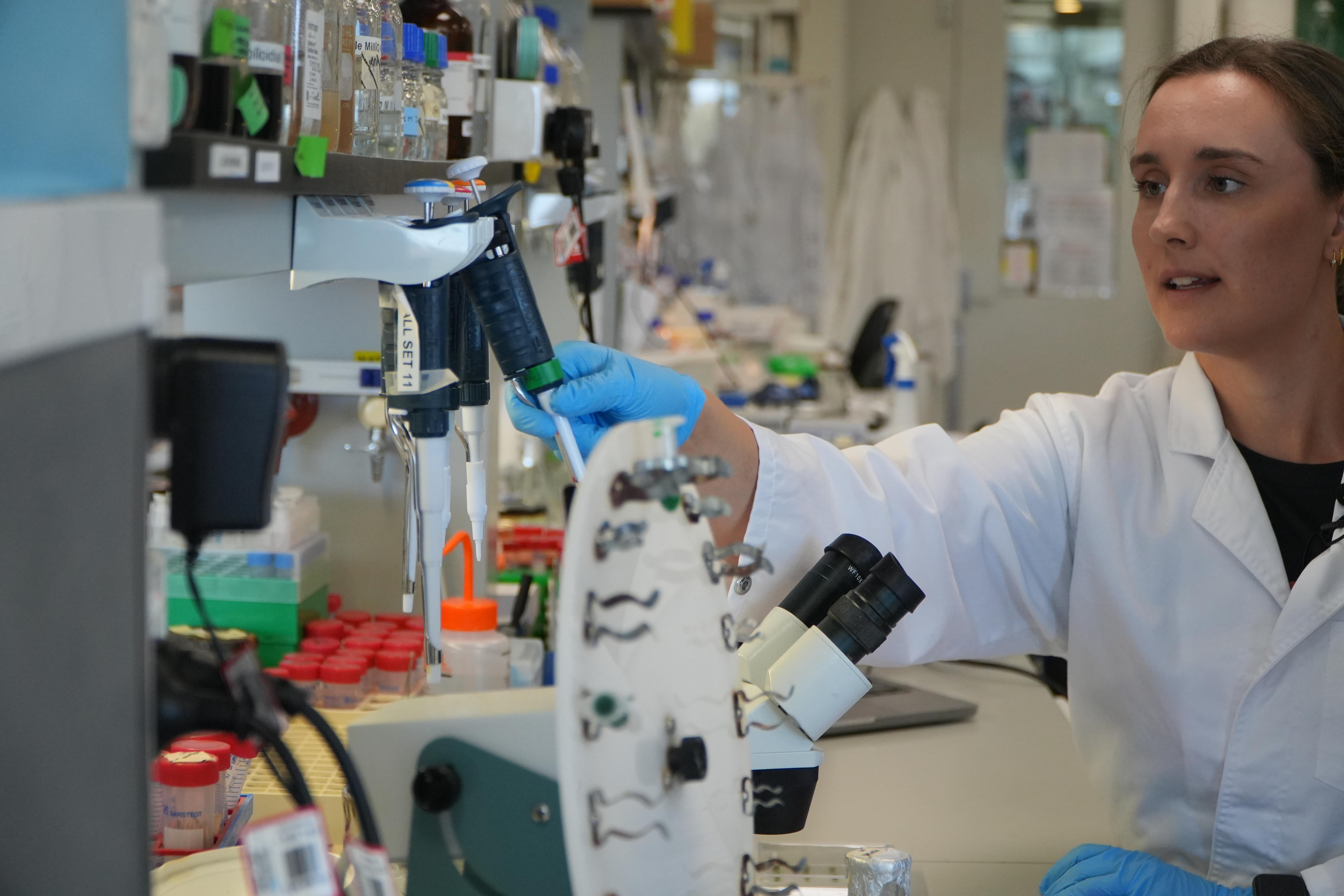 Plants for Space researcher Leni Campbell-Clause working with equipment in the lab.