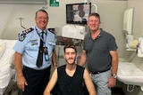 Police Commissioner Ian Stewart with Constable Peter McAulay (middle) and his father Mike McAulay.