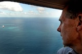 Greens Senator Bob Brown inspects the Chinese registered vessel Shen Neng 1 on Douglas Shoal