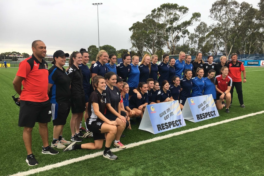 A group photo of soccer players.