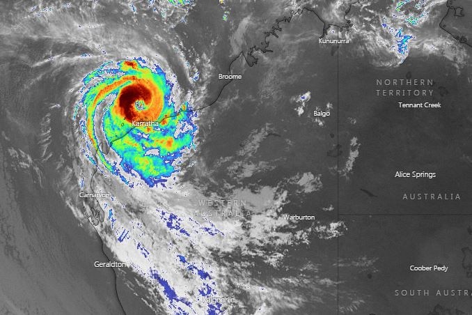 A multicoloured satellite photo of the cyclone.