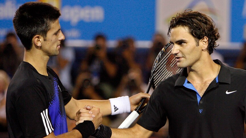 Novak Djokovic and Roger Federer shake hands at the net at the 2008 Australian Open.
