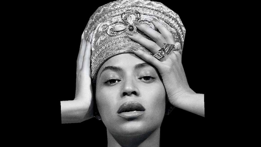 Album art featuring a black and white portrait of Beyonce in a jewelled headdress