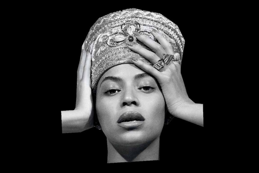 Album art featuring a black and white portrait of Beyonce in a jewelled headdress