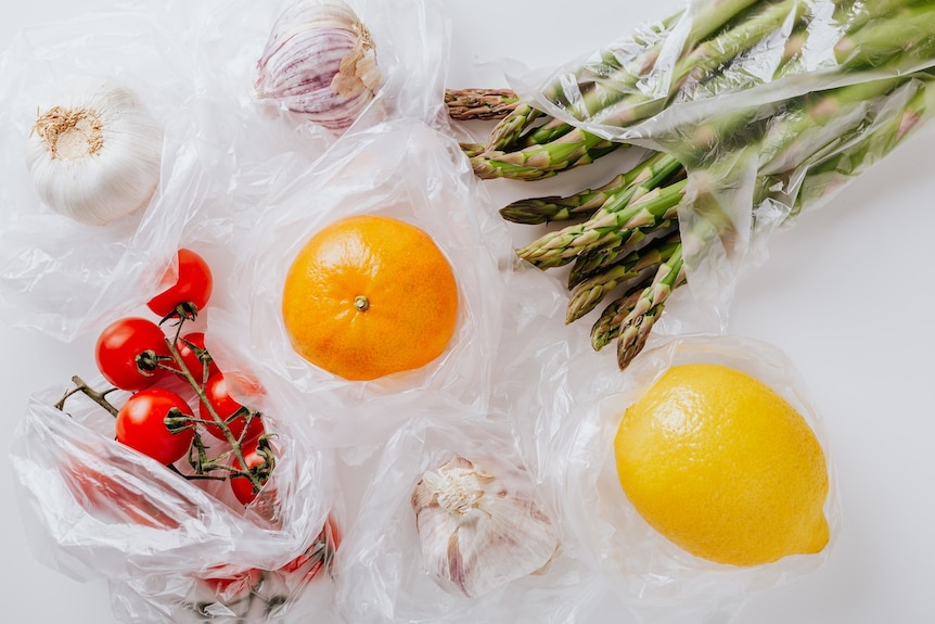 fruits and vegetables in plastic bags