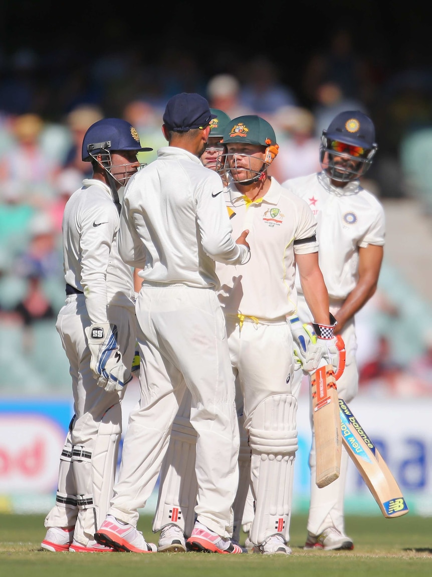 Heated moment ... David Warner Virat Kohli exchange words on day four