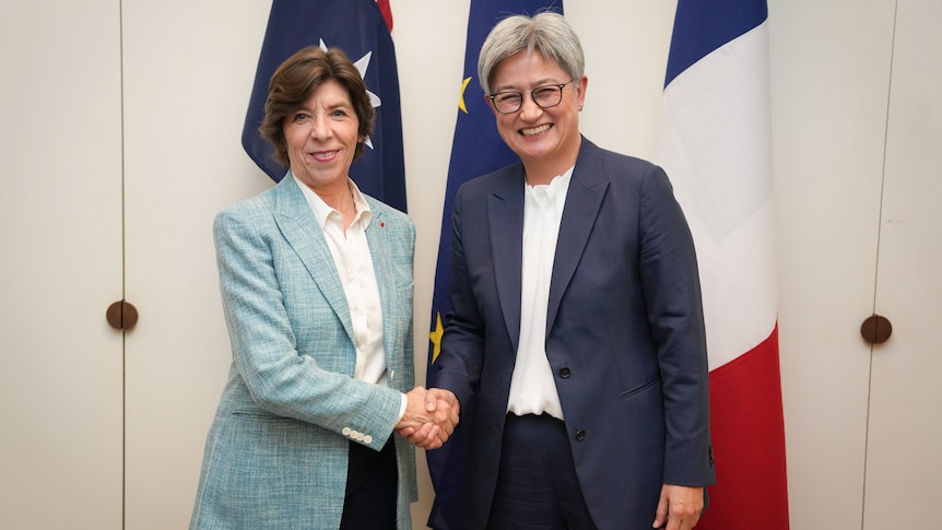 Penny Wong shakes hands with French Foreign Minister Catherine Colonna in Canberra.