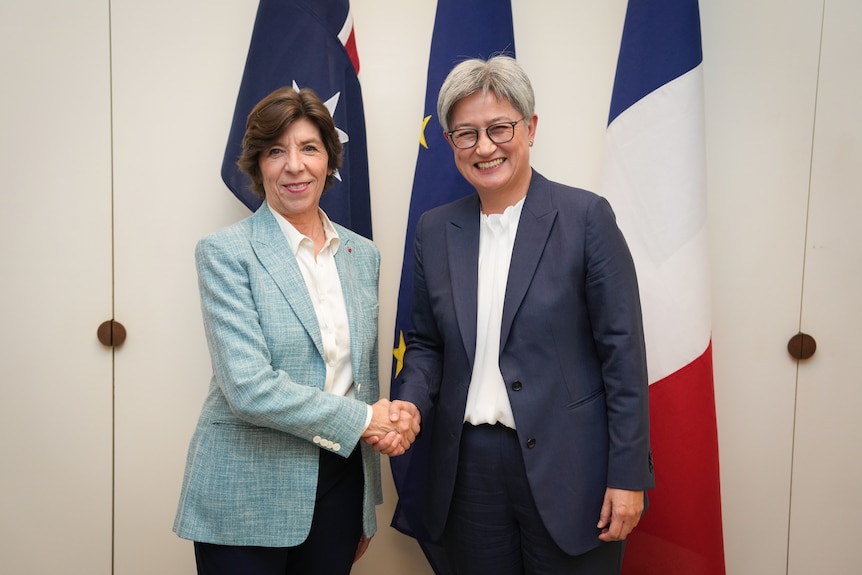 Penny Wong shakes hands with French Foreign Minister Catherine Colonna in Canberra.