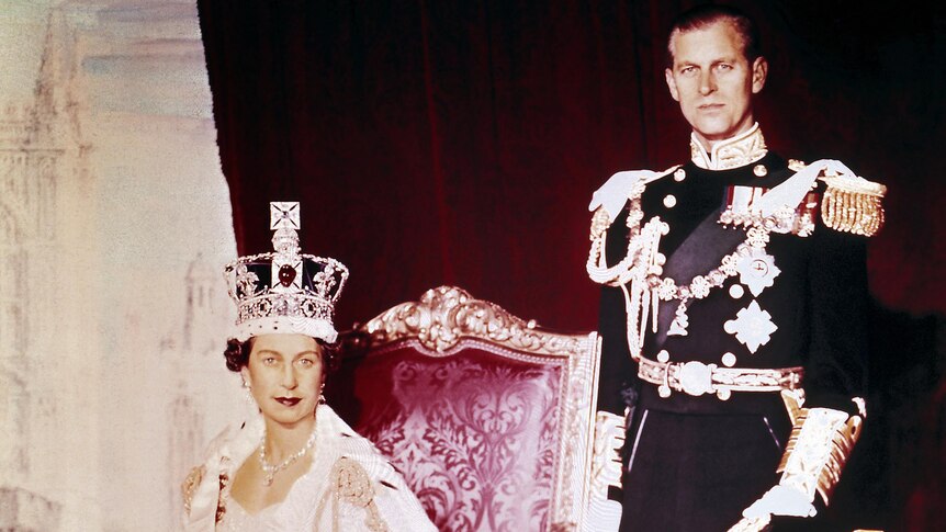 Queen Elizabeth II and Prince Philip pose for an official portrait in Buckingham Palace.