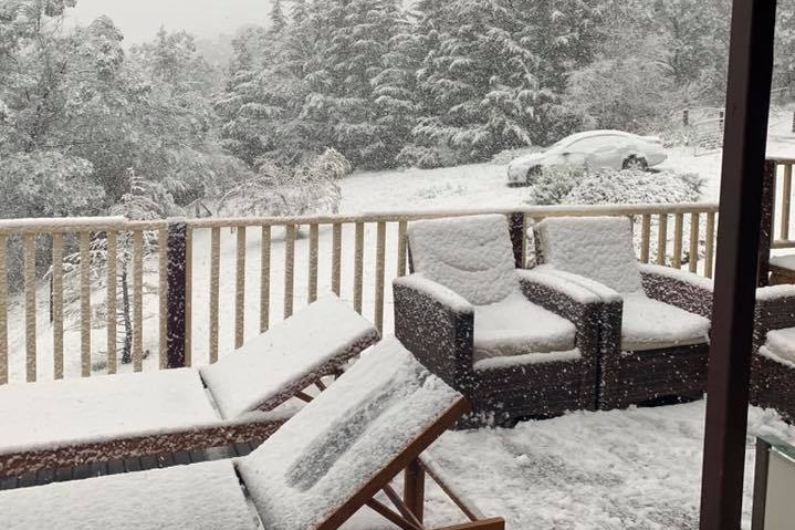 Snow at a house in Wattle Hill near Sorell