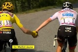Two men on bikes shake hands.