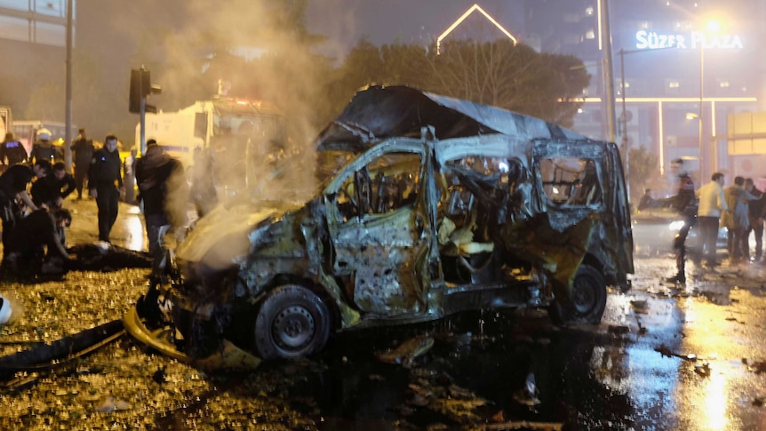 A damaged vehicle after a blast in Istanbul