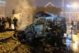 A damaged vehicle after a blast in Istanbul