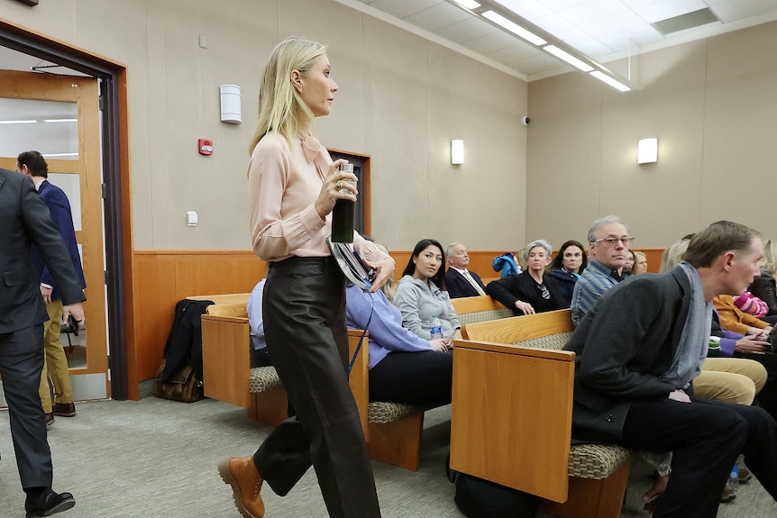 Gwyneth Paltrow walks into a court room 