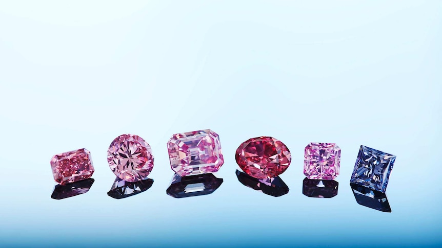 Close up of six coloured diamonds