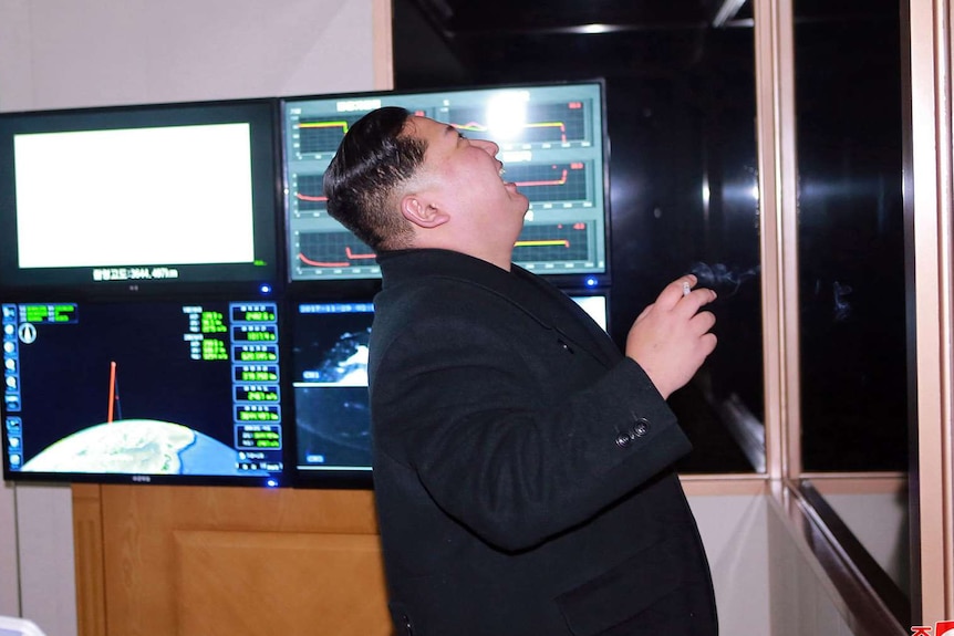 Kim Jong-un inspects an intercontinental ballistic missile test.