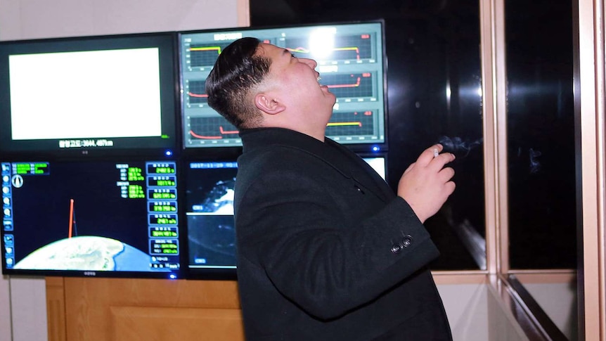 Kim Jong-un inspects an intercontinental ballistic missile test.