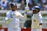 Sangakkara salutes after notching 10,000 runs