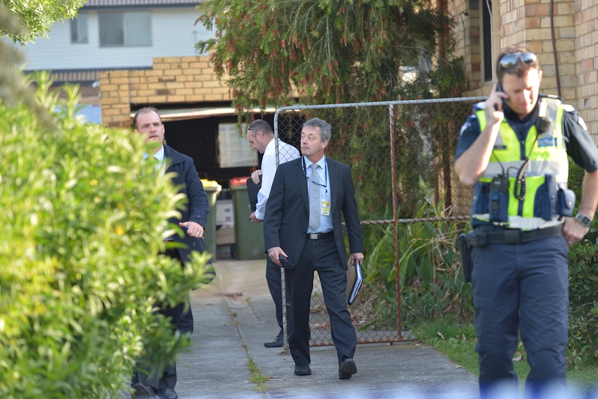 Police attend the scene of a shooting at a house in East Bentleigh, Melbourne.
