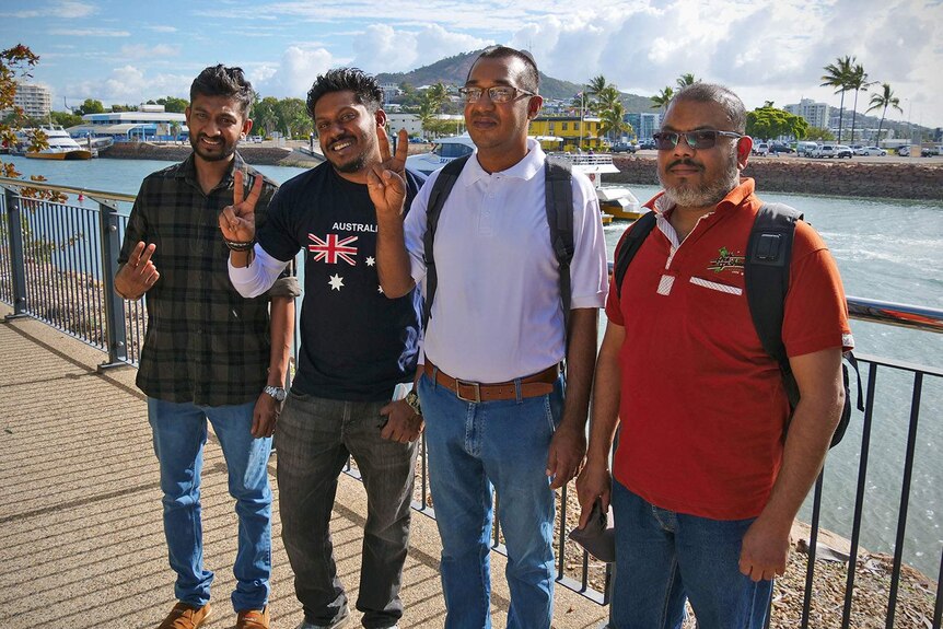Sri Lankan seafarers Lashan Walagedara, Bandara Ranaseha, Sajith Gunasekara and Ajith Nandasena in Townsville