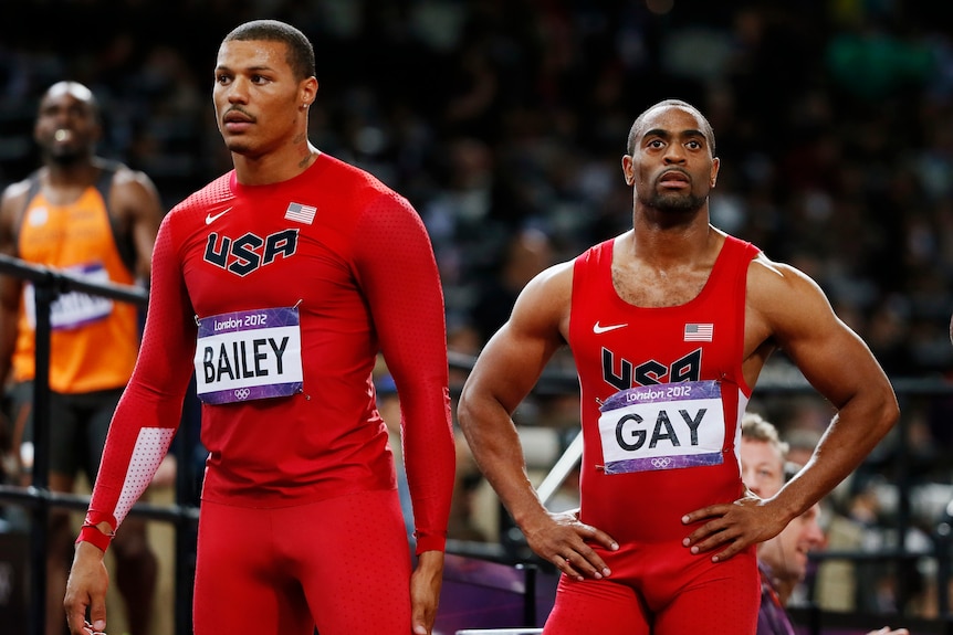 Ryan Bailey (L) and Tyson Gay of the US look on after the sprint. Bailey placed fifth and Gay finished fourth.