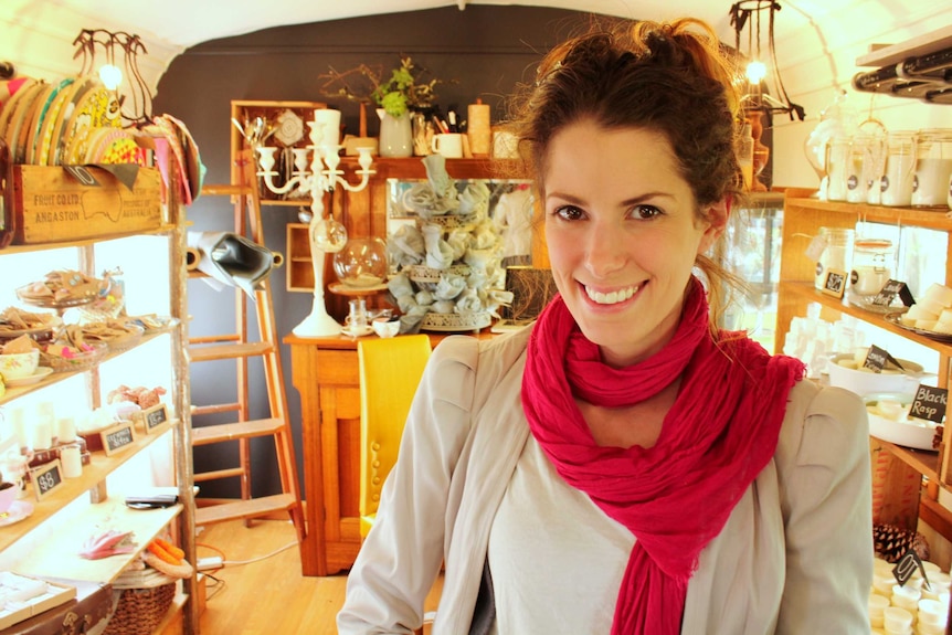 Tiffany Voss standing in her gift shop at the Margate train site.