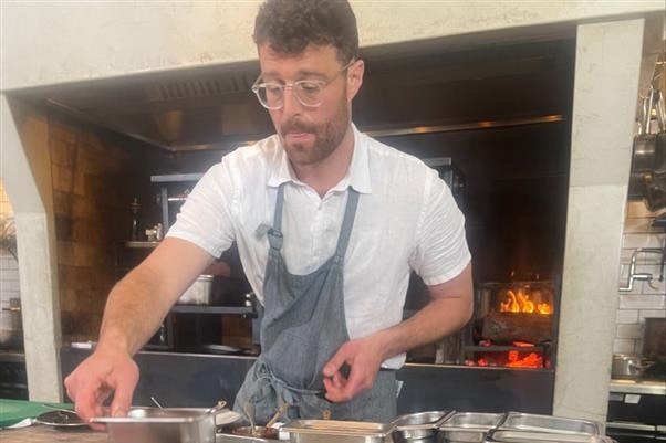 Photo of a chef cooking.