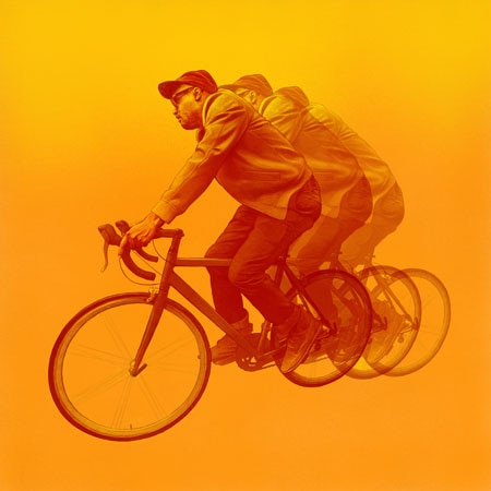 Aaron Livingstone rides a bicycle on the cover of the Son Little album Aloha