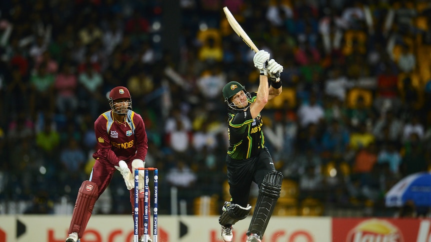 Shane Watson hoists one over the fence in Australia's rain-affected match against the West Indies.