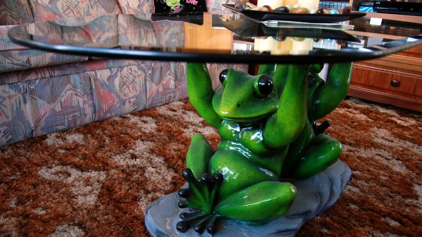 Ms Burtt's coffee table is made of two frogs back to back holding up the glass top.