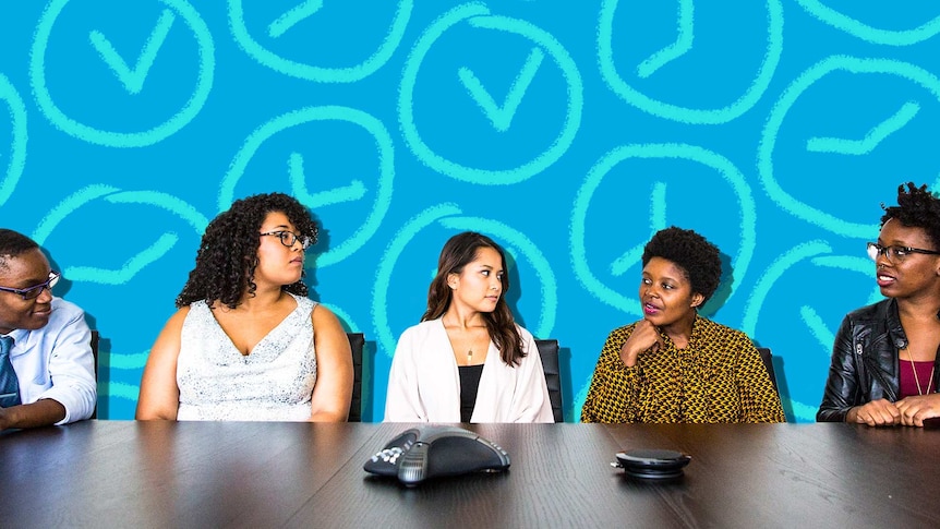 Five people sit next to each other at a conference table for a business meeting to depict how to make meetings more productive