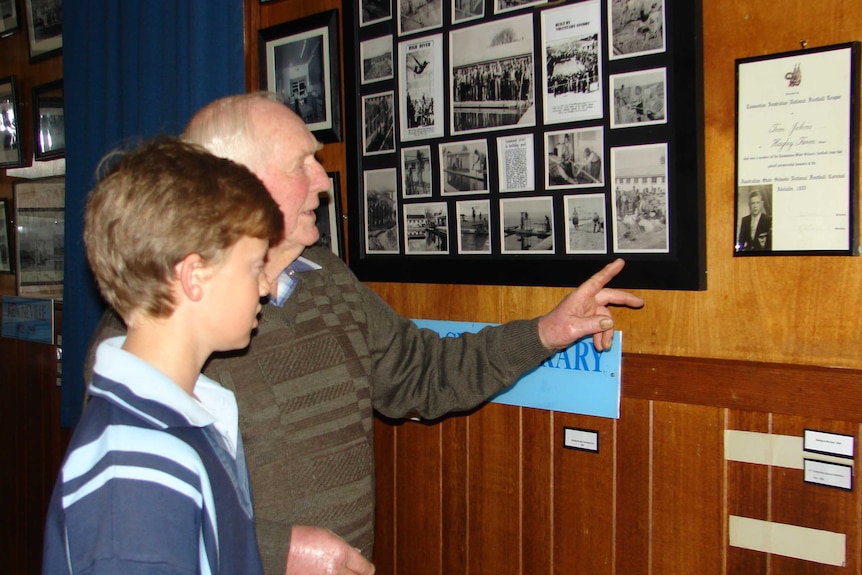 Former Hagley farm school student Tom Johns and grandson Alex