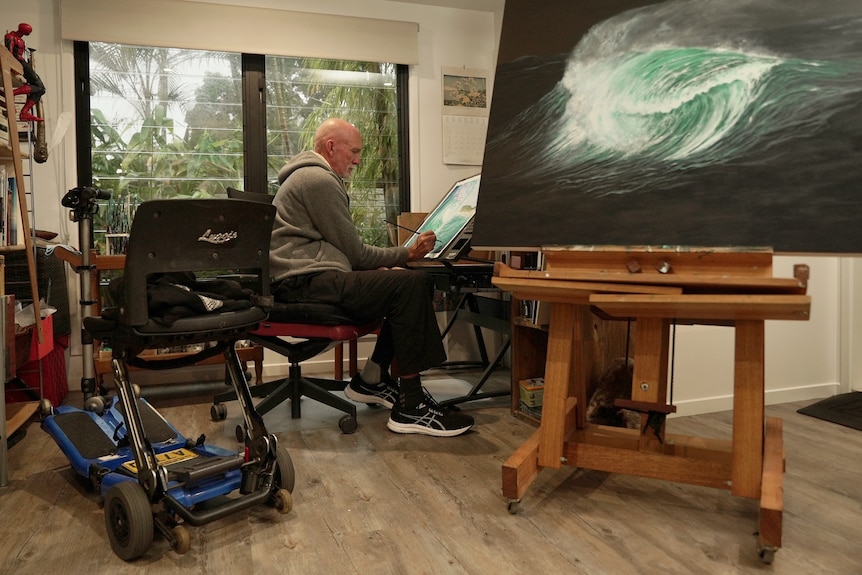 Colin painting in his studio