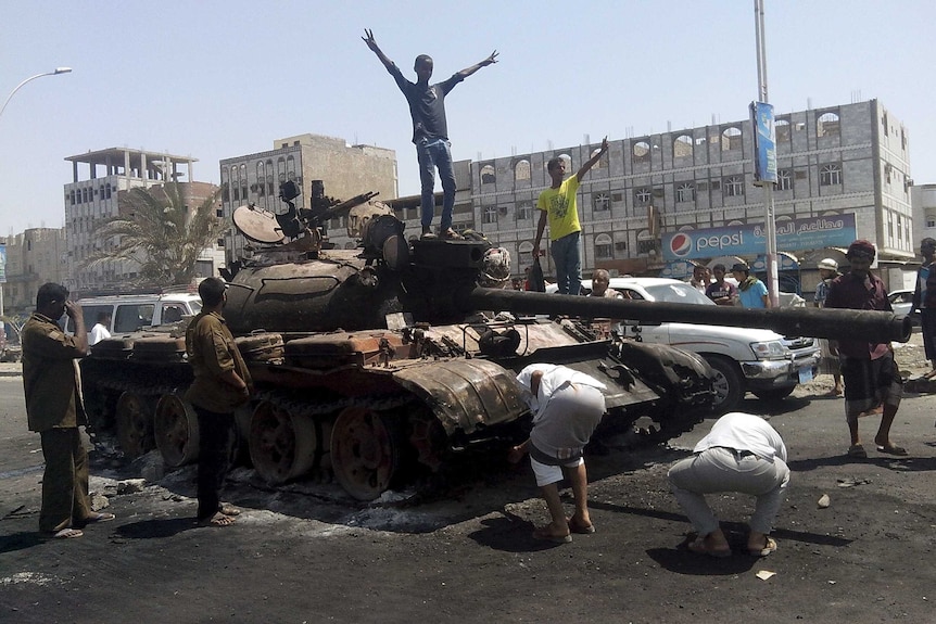 A burnt out tank in Yemen's southern port city of Aden on March 29.
