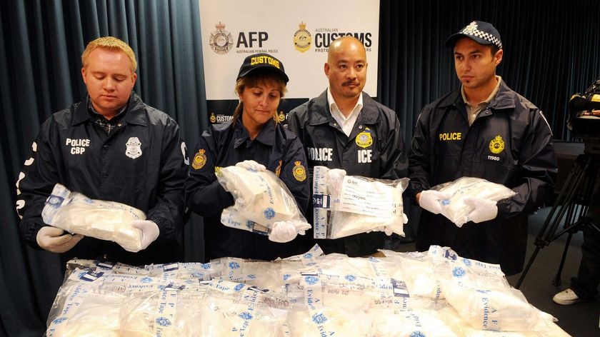 Law enforcement officers show their latest drug bust in Melbourne