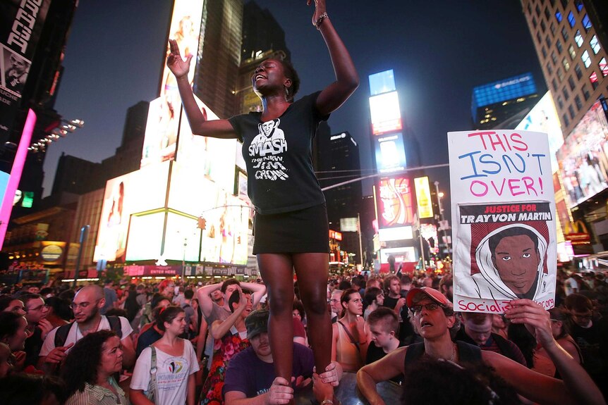 Trayvon Martin supporters block traffic in Times Square.