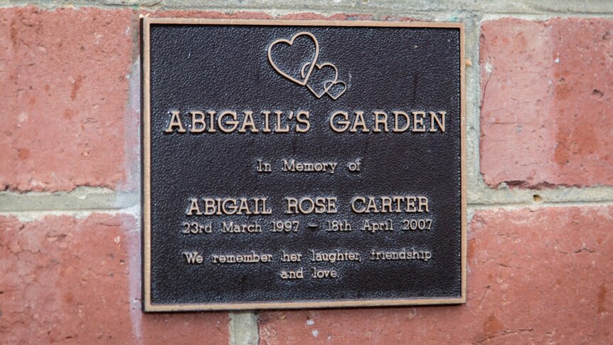 The Friends of Abigail's Garden group display a plaque in honour of Abigail Carter at the garden.