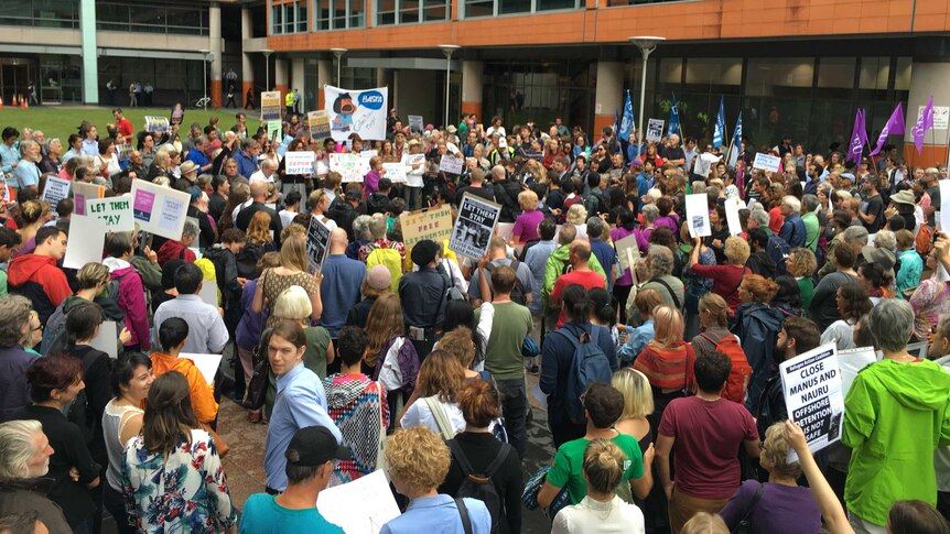 About 300 people outside the Department of Immigration in central Sydney.