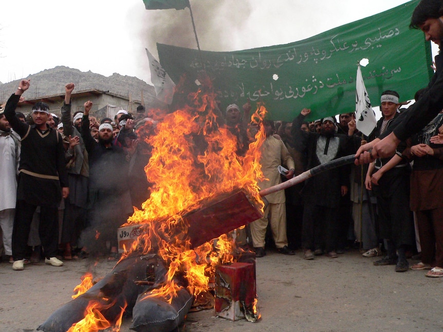 Effigy burned as Afghan university students protest in Jalalabad.